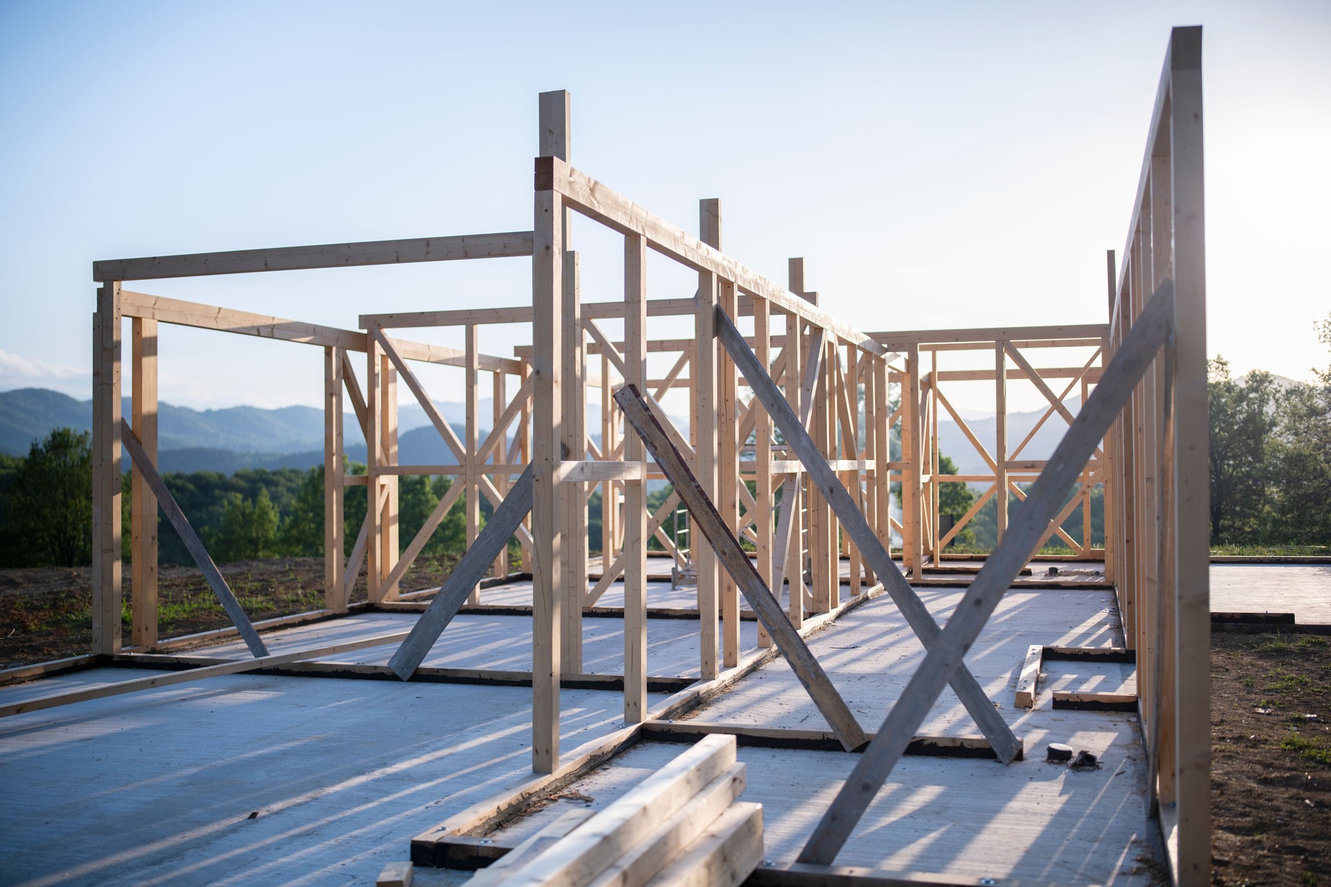 Construction site of a wooden house in nature.